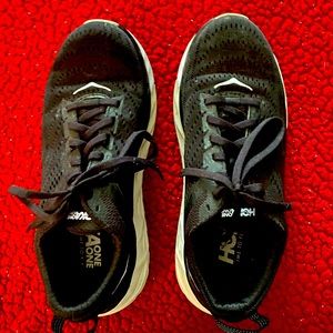 Black Hokas size 7. Good condition.  White/black Skechers size 7. Like new.
